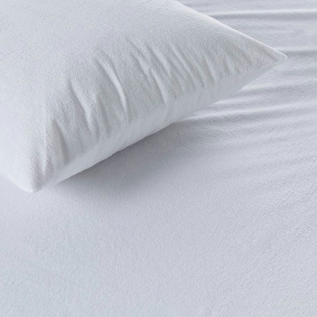 Waterproof Terry Towelling Mattress Protector on a pillow