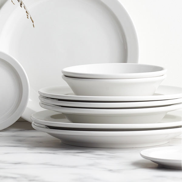 Multiple Toughened Winged Serving Plates neatly stacked, highlighting their space-saving, stackable feature suitable for both personal and professional settings.