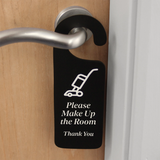 Reverse side of the wooden door hanger showing the message 'Please Make Up The Room' in white text.