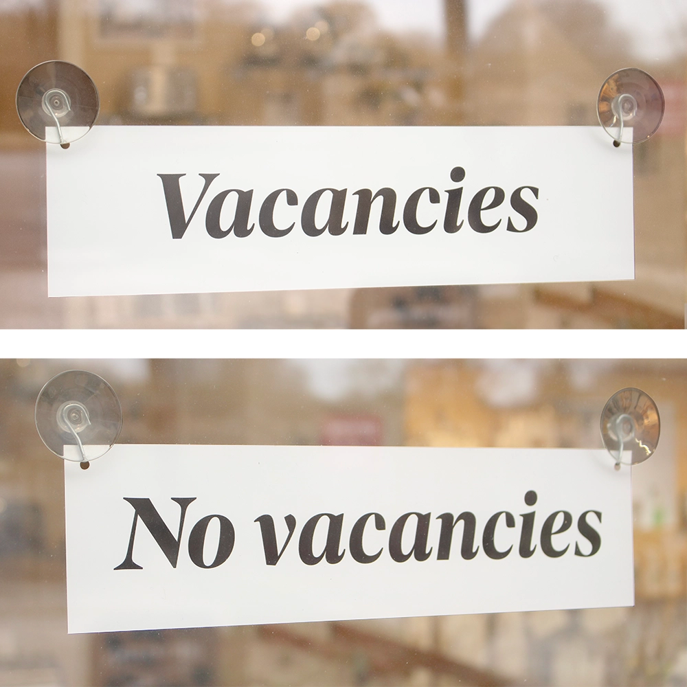 vacancies and no vacancies sign, showing both sides displayed on suckers and hooks